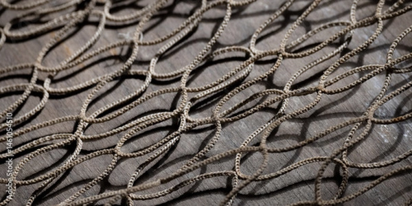 Fototapeta Fishing net on rustic old wood, fishing concept, art craft themes

