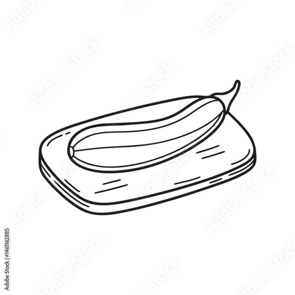 Fototapeta A snake gourd resting on a chopping board