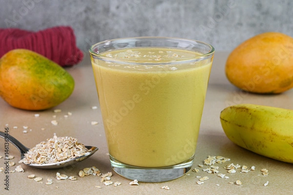 Obraz Banana mango oatmeal in a cup.