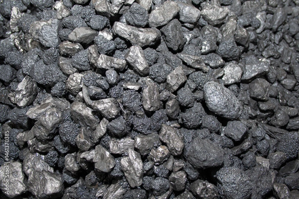 Obraz Pile of black coal stones with roughness and bulging on the outside, intended as fuel for domestic or industrial use, extracted from the mining basins of Asturias