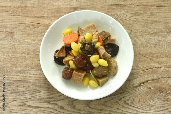 Fototapeta deep fried tofu and gluten with yellow ginkgo and pickled jujube couple black mushroom in soy sauce vegetarian food on plate 