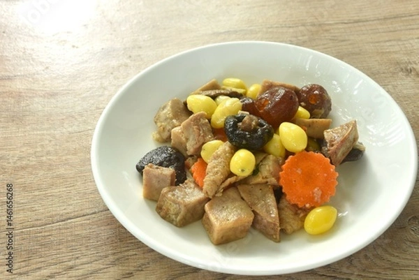 Fototapeta deep fried tofu and gluten with yellow ginkgo and pickled jujube couple black mushroom in soy sauce vegetarian food on plate 