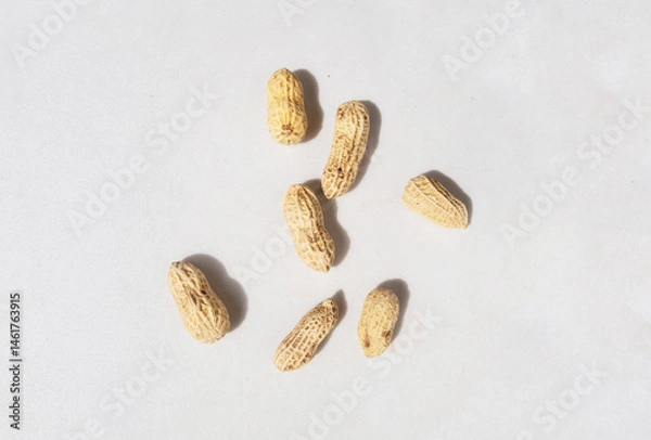 Obraz peanuts on a black background