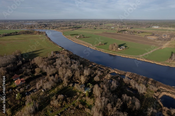 Fototapeta Aerial view of river Lielupe, Zemgale, Latvia in early spring