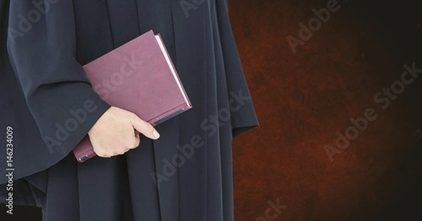Fototapeta Midsection of judge holding book