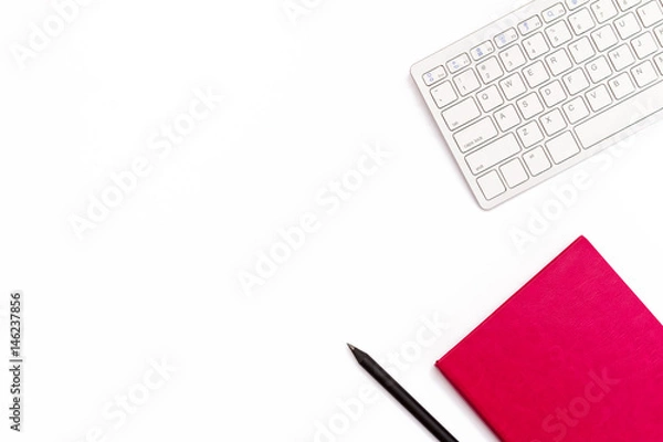 Fototapeta keyboard, pink diary and a black pen on a white background. Minimal feminine business concept. Flat lay.