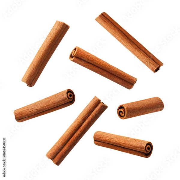 Fototapeta A close-up shot of cinnamon sticks, showcasing their rich brown color and distinct texture. The cinnamon sticks are artistically arranged against the background.