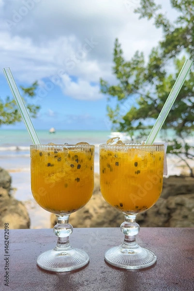 Obraz Two passion fruit drinks on the beach