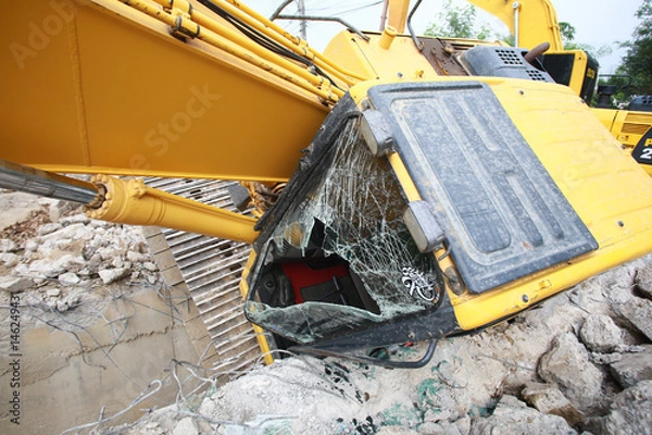 Fototapeta The backhoe is overturning at the construction site, Top Photos