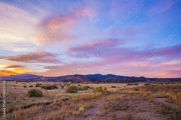 Obraz sunset over desert mountains 