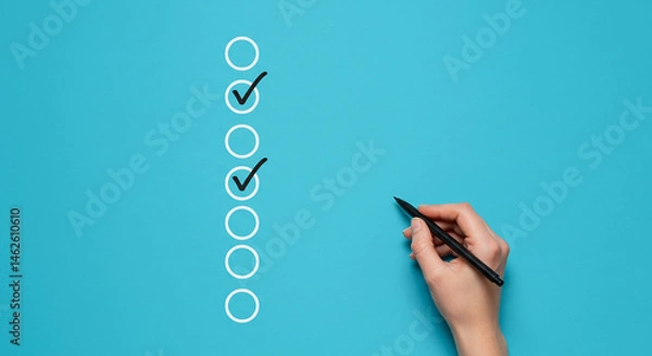 Fototapeta Hand marking a checklist with a pen on a blue background showing progress and task completion status real estate business ,technology ,selling ,purchasing ,agreement
