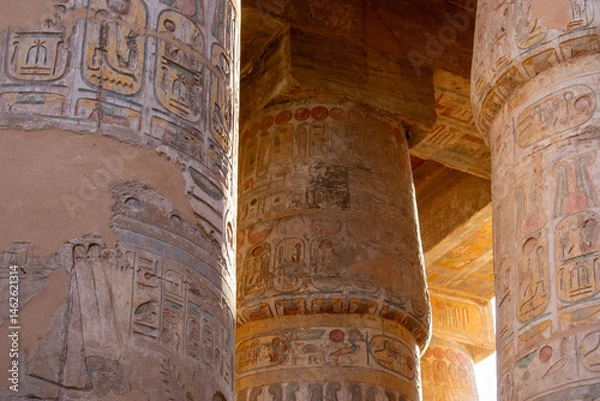 Fototapeta Karnak Temple in Luxor, Egypt. Hieroglyphs and Art on pillars and walls. Temples, pylons, chapels, and other buildings in Karnak Temple Complex 