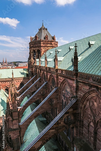 Obraz The building Cathedrale Notre Dame de Strasbourg has a green roof and is very old