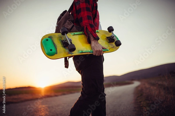 Obraz Man with a yellow skateboard