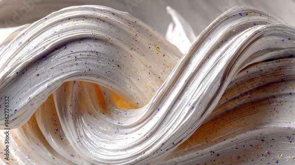 Fototapeta Luxurious cream with golden and purple speckles in swirling texture, suggesting skincare innovation