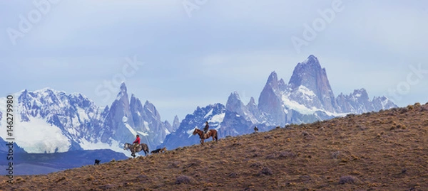 Obraz Gaucho riding against the background of Mount Fitz Roy, Patagonia, Argentina
