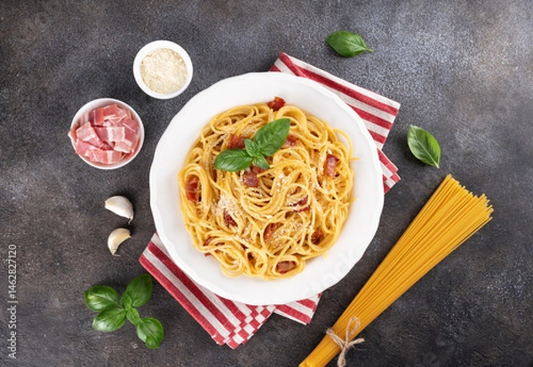 Obraz Italian pasta carbonara with ingredients on gray background. Homemade carbonara recipe for food blogs, menus, books