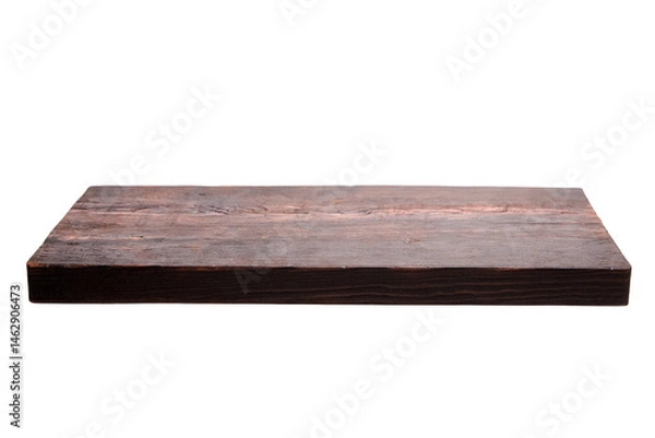 Fototapeta A rectangular rustic wooden cutting board with dark brown tones, visible wood grain, and worn surface, isolated on a white background