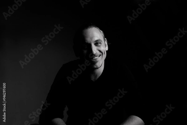 Fototapeta Cheerful smiling man