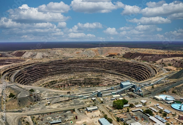 Fototapeta diamond mine aerial view open pit in Botswana, extraction of kimberlite from the quarry processed at nearby factory