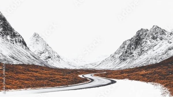 Obraz Serene Winter Landscape with Winding Road and Snow-Capped Mountains under Cloudy Sky