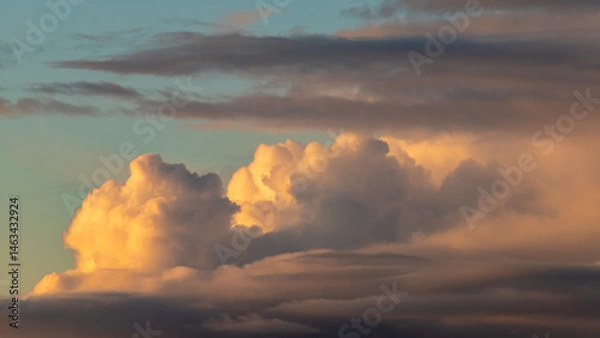 Obraz Colorful dramatic sky with cloud at sunset. Close up.