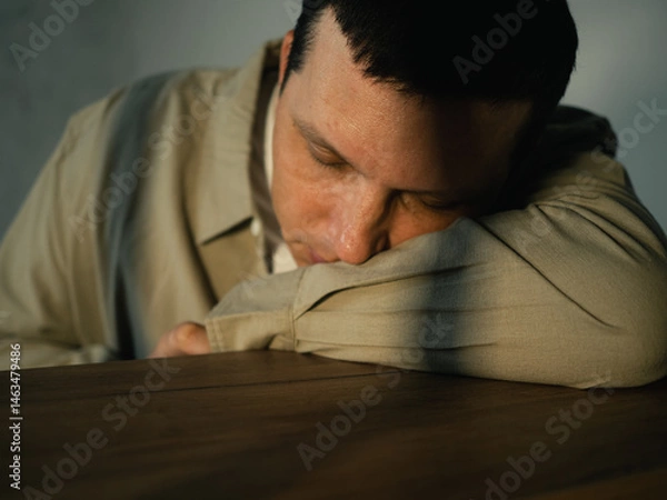 Fototapeta Sad adult man at home.