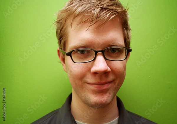 Obraz young man with glasses smiling