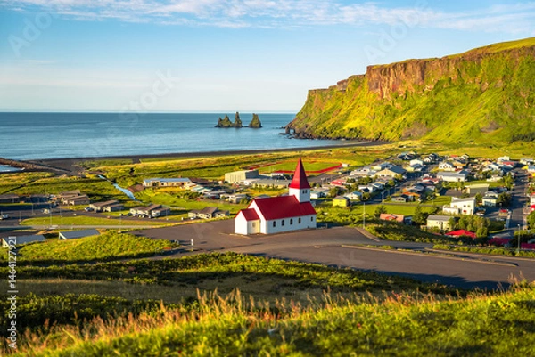 Obraz View of basalt stacks Reynisdrangar, black sand beach, church and city of Vik, Iceland