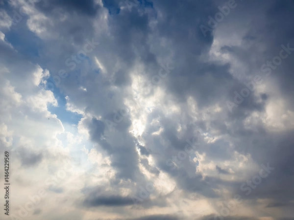 Obraz Blue sky with clouds and sunshine. Sky landscape on the horizon with clouds.
