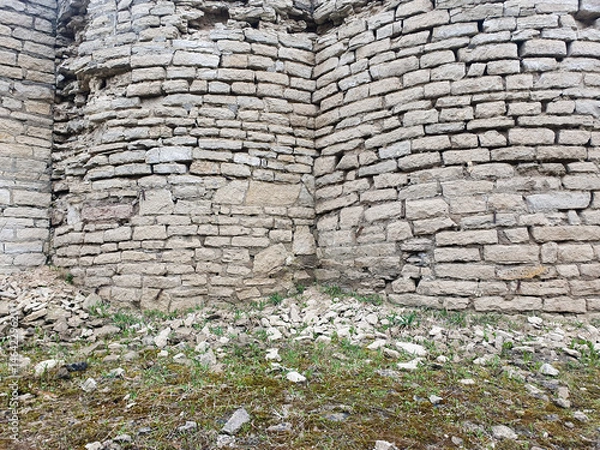 Obraz An ancient wall of stone, ruined ancient wall of brick.