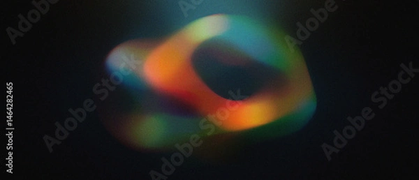 Fototapeta Colorful glowing abstract ring shape fluid motion with grain noise texture on dark background, vibrant cinematic. digital innovation fiction, website header banner music poster