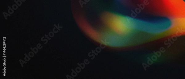 Fototapeta Colorful glowing abstract ring shape fluid motion with grain noise texture on dark background, vibrant cinematic. digital innovation fiction, website header banner music poster