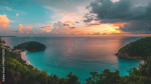 Fototapeta Serene ocean with tropical island under vibrant cloud-dotted sky, warm light