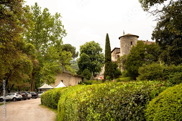 Fototapeta Scenic View Of Lake Toblino, Italy, Framed By Trees With A Historic Castle On The Shore