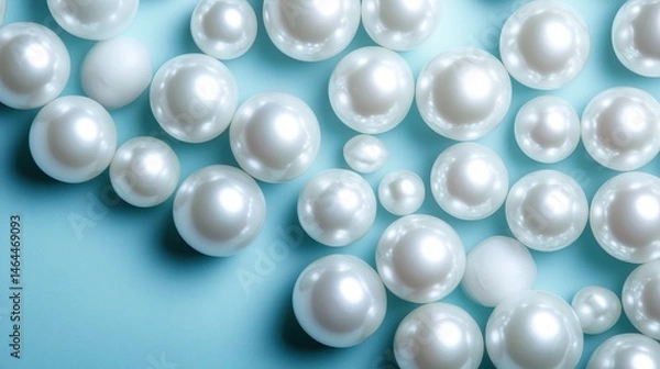 Fototapeta This stunning image captures a collection of lustrous white pearls elegantly arranged, reflecting sophistication and beauty in a serene, minimalist style.