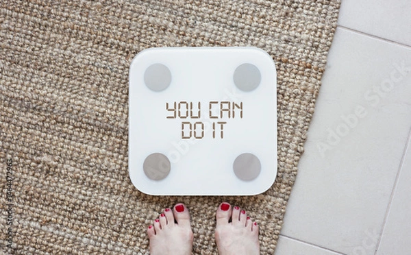 Fototapeta YOU CAN DO IT text written on digital scale screen. Weight loss concept. diet motivation background