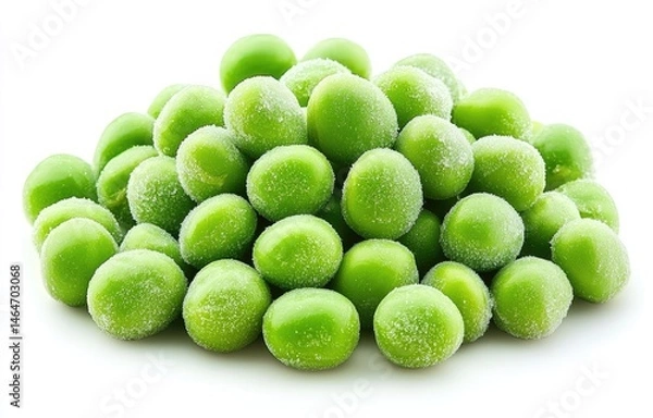 Fototapeta Frozen peas piled high. Freshly frozen, small, round, green peas covered in a fine frost.  A close-up view against a white background