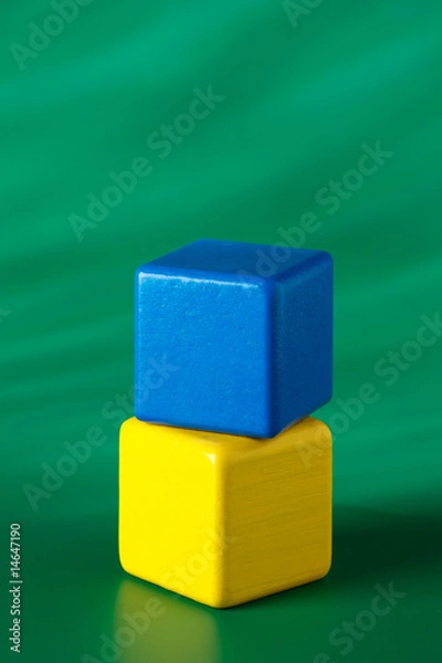 Fototapeta Blue & yellow blocks on green background 3