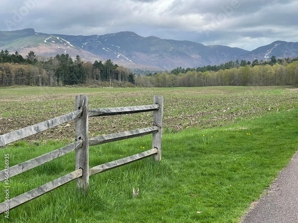 Obraz Walking bike path winds through the green countryside, farms, and mountains of Vermont in this picturesque scene