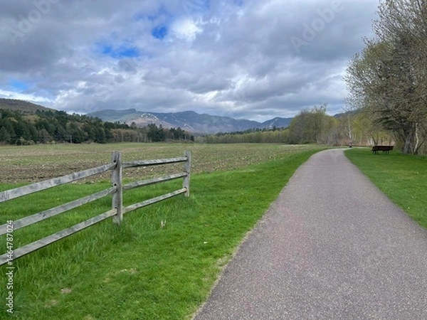 Obraz Walking bike path winds through the green countryside, farms, and mountains of Vermont in this picturesque scene