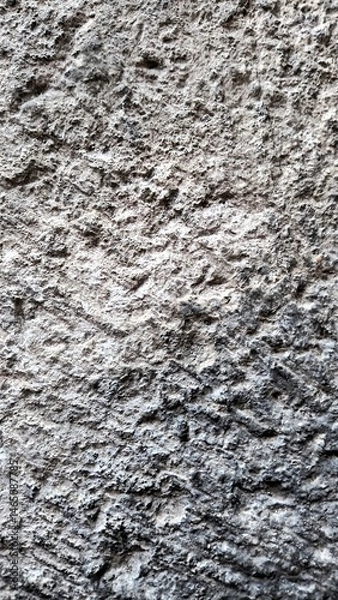 Obraz Textured stone wall with intricate patterns and a natural gray tone in close-up view
