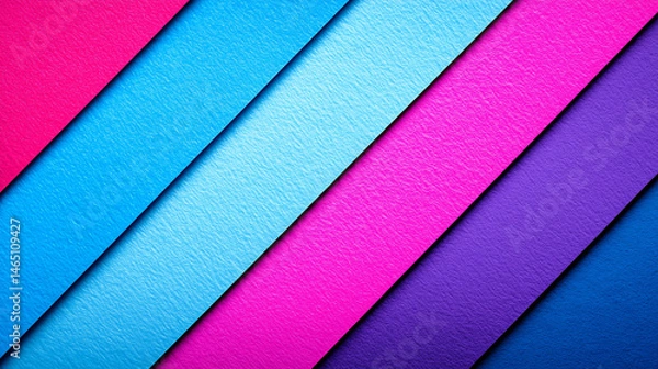 Fototapeta Diagonal layered textured paper in vibrant shades of blue, pink, and purple creating bold geometric abstract background