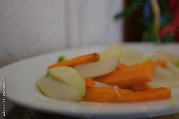 Obraz Christmas Roasted Parsnips and Carrots with decoration, gifts, green tree branch on wooden rustic table. High quality photo