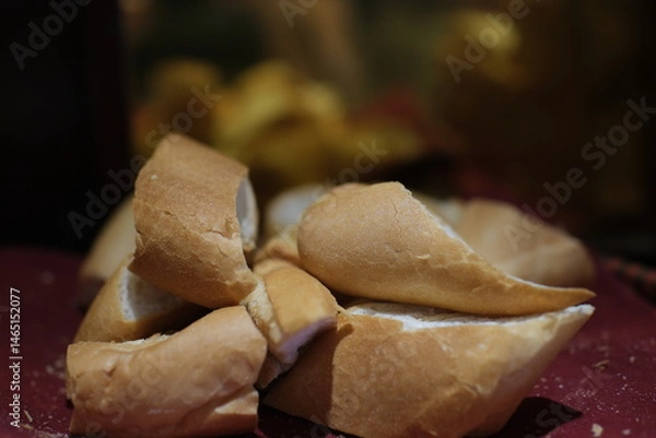 Obraz one loaf of wheat flour on the table, using white bread for cooking close up. High quality photo