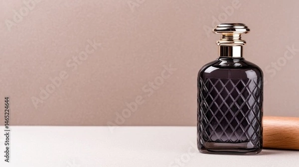 Fototapeta Elegant perfume bottle with a diamond pattern on a soft background showcasing luxury and simplicity