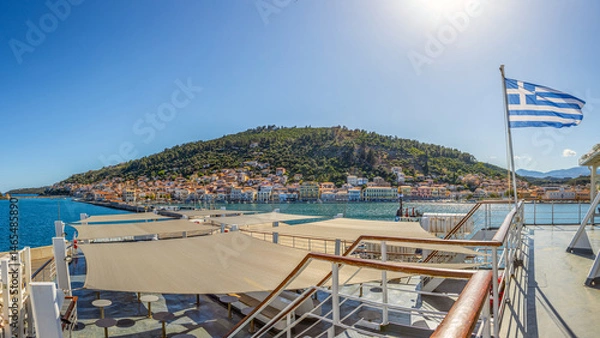 Fototapeta Feryy leaving the port of Gythio on its way to Crete, Greece on a sunny day
