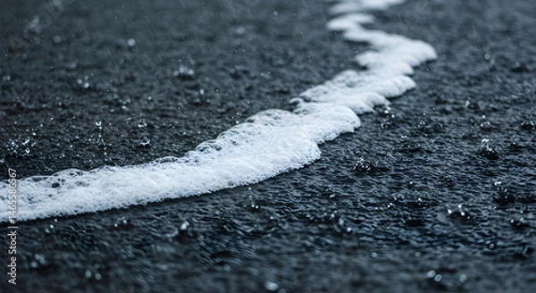 Fototapeta Mystic Cascade Of Splashes And Foam On Wet Asphalt Road