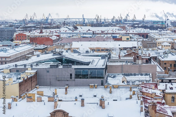 Obraz Old buildings roofs under the snow. Saint Petersburg.