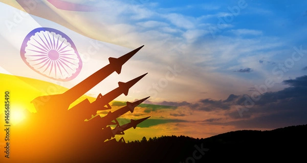 Fototapeta The missiles are aimed at the sky at sunset with Indian flag. Nuclear bomb, chemical weapons, missile defense, a system of salvo fire.
